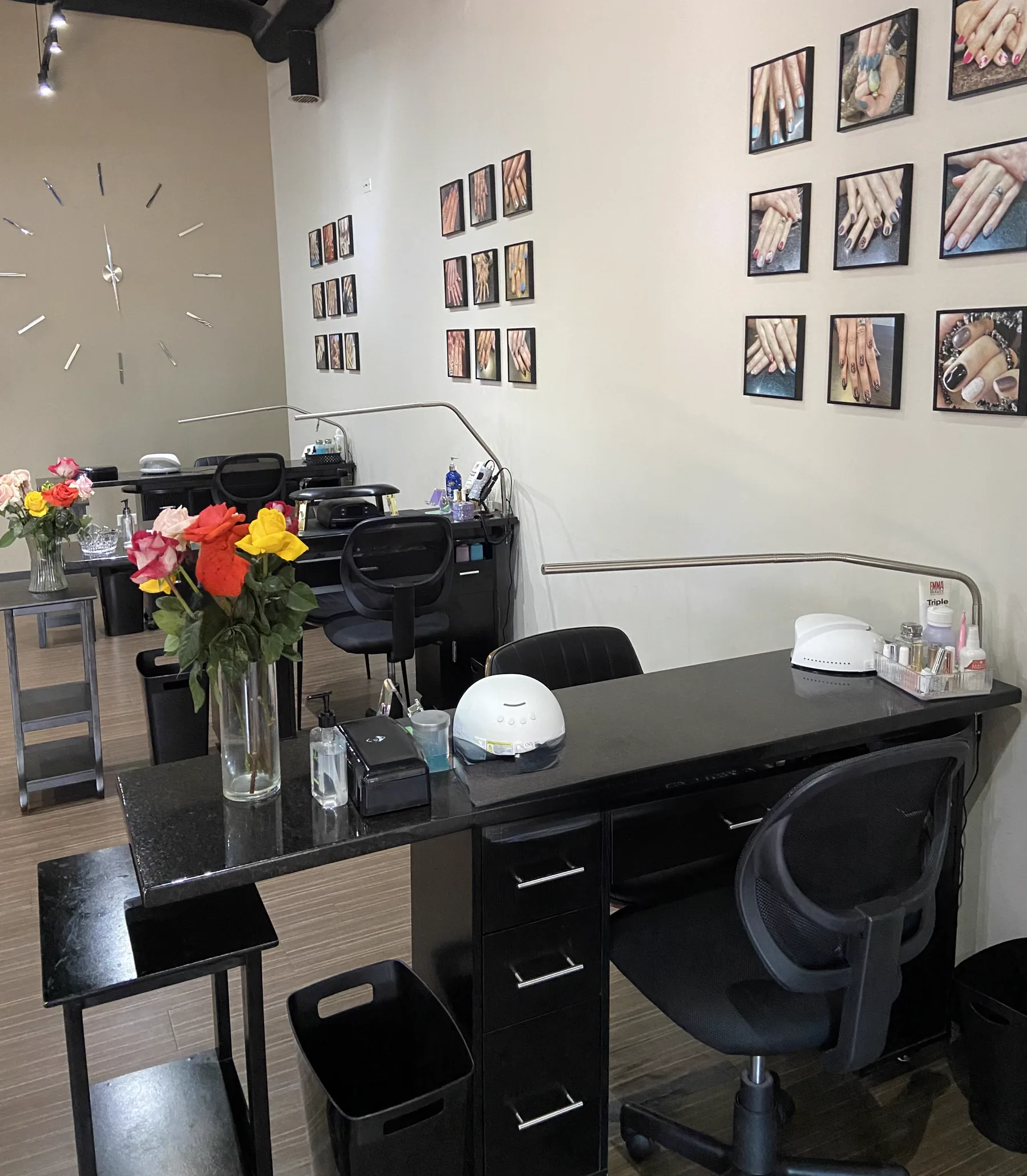 Manicure stations with fresh flowers at Neo Bella Salon