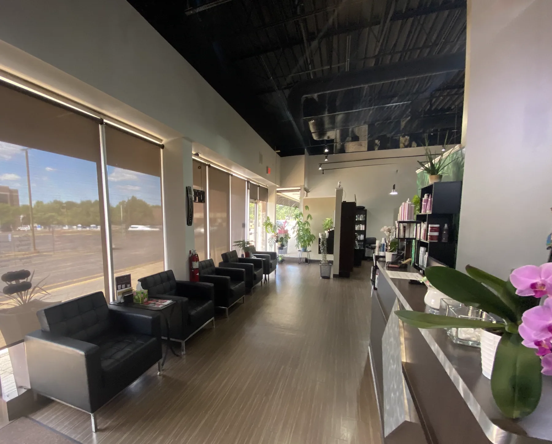 Neo Bella's sunlit waiting area beside the front windows