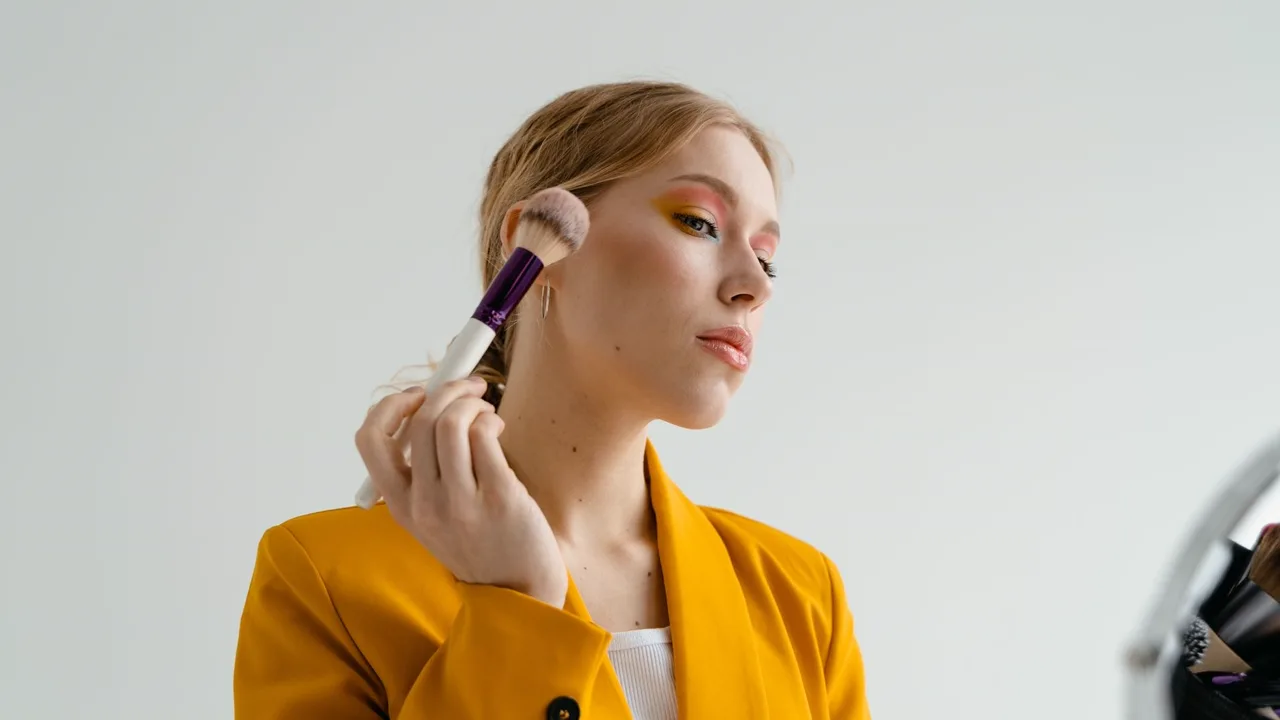 Event makeup being applied with a brush
